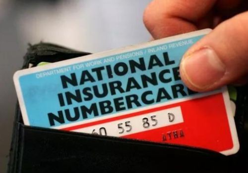 National insurance card being pulled out of wallet