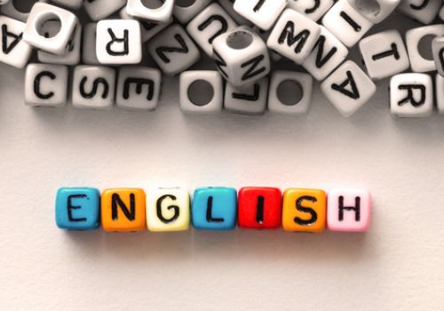 Word English spelled out with beads
