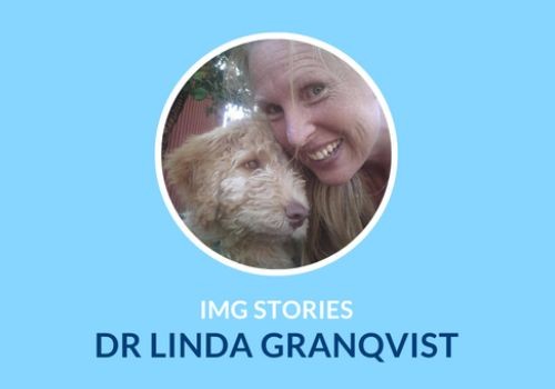 Linda Granqvist smiling with her dog, Iris