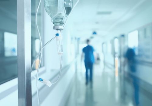 Doctors walking through hospital