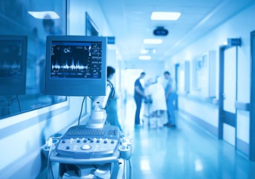 Doctors walking through hospital