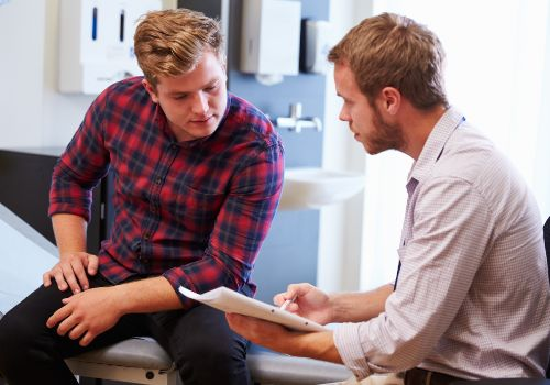 Doctor talking to patient